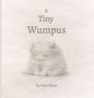 "A Tiny Wumpus by Julia Shaw." Illustration eines kleinen, pelzigen Wesens mit Hörnern, das sanft und unschuldig aussieht., Buch