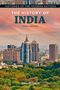 "The History of India", dritte Auflage von John McLeod. Skyline einer modernen Stadt bei Sonnenuntergang., Buch