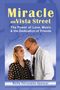 "Miracle on Vista Street: The Power of Love, Music & the Dedication of Friends" von Retha Petruzates-Spencer. Zwei Personen lächeln., Buch
