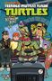 "Teenage Mutant Ninja Turtles: The Booyakasha Books, Volume Two." Illustrative Szene mit Turtles, Pizza, Skateboard und TV.