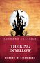 "THE KING IN YELLOW" von Robert W. Chambers. Silhouette eines Schlosses vor vollem Mond, umgeben von Fledermäusen., Buch