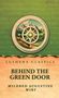 Text: "Lushena Classics", "Behind the Green Door", "Mildred Augustine Wirt". Illustration: Berglandschaft hinter einem Steuerrad., Buch