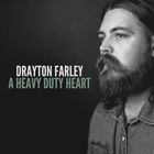 DRAYTON FARLEY A HEAVY DUTY HEART. Schwarz-weiß Porträt eines Mannes mit Bart und langen Haaren in denim Hemd.