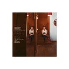 Texte: Seite A - "Tastes So Good" bis "Little More Time"; Seite B - "Flowers" bis "End of an Era". Ein Mann sitzt, gespiegelt.