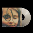 Texte: "SUPERHEAVEN" und "OURS IS CHROME". Ein verschwommenes Gesicht, das eine Schlange nahe den Augen hält. Vinyl-Schallplatte.