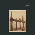 Text "CASPIAN" oben rechts, darunter ein Foto von alten, ruinenartigen Strukturen mit Säulen aus Stein.