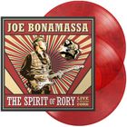 "JOE BONAMASSA", "THE SPIRIT OF RORY", "LIVE FROM CORK" in rot-goldener Grafik mit zwei Gitarristen vor Strahlen.