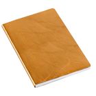 Ein Notizbuch mit goldenem Einband. Keine sichtbaren Texte.