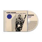"Cory Wong Live at Montreux Jazz Fest." Cover mit Foto von Mann und Gitarre, blauem Punkt und schwarzen Linien. CD-Hülle.