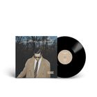 Plattencover mit "mattias nimonn" oben und "BEIGE" unten. Ein Mann im Mantel vor Bäumen, neben einer Vinyl-Schallplatte.