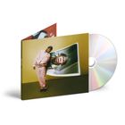 Texthinweis: "CALL ME IF YOU GET LOST". Ein CD-Cover zeigt eine Person in rosa Anzug vor gelbem Hintergrund mit großem Ausdruck.