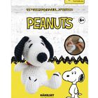Oben steht "PEANUTS", daneben ein Videosymbol. Darunter ist ein gehäkelter Hund mit schwarzen Ohren abgebildet.