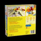 „MEINE ERSTEN SPIELE - Stein auf Stein“, ein kooperatives Bauspiel für Kinder. Enthält Spielmaterial aus Holz.