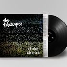 Eine Schallplatte mit Hülle. Texte: "the telescopes", "static charge". Das Design ist körnig und dunkel, mit farbigen Akzenten.
