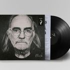 Text: "FaUSt" und "Moi". Schwarz-weißes Porträt eines älteren Mannes auf einem Albumcover mit Schallplatte.