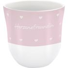 „Herzensfreundin“ steht in weißer Schrift auf einem zartrosa Becher mit kleinen weißen Herzen.