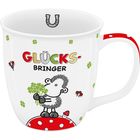 Text: "GLÜCKSBRINGER." Illustration: Ein Schaf hält Kleeblätter auf einem Pilz. Marienkäfer und Kleeblätter umgeben es.