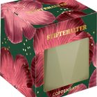 Text: "STIFTEHALTER", "COPPENRATH". Dunkelgrüner Würfel mit rosa Blüten und goldenen Punkten. Ausschnitt auf einer Seite.