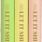 Drei bunte, hohle Stifte mit dem Text "LET IT SHINE". Farben: Grün, Gelb, Rosa. Mit goldenen Ringen verziert.