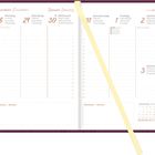 Kalender mit Daten vom 28. Dezember bis 3. Januar, Notizfelder und Feiertagsmarkierungen. Beige Lesezeichen.