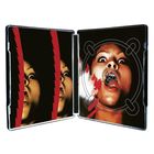 Ein Schallplattencover mit schreiendem Gesicht, durchtrennt von roten Zickzack-Mustern.