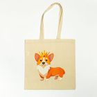 Stofftasche mit Illustration eines lachenden Corgis, der eine goldene Krone trägt.