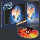 "Sacred Leather", "Keep the Fire Burning". Metall-Herz in Flammen. CD-Cover und Disc mit identischem Design.