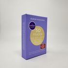Erhebliche Schrift: "50 Fragen, die das Leben leichter machen." Lila Box mit goldenen und roten Akzenten.