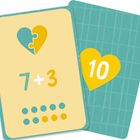 "7 + 3", Herzmotiv mit Puzzleteilen, untere Karte hat gelbes Herz mit "10". Geometrisch gemustert, farbenfroh.