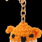 Text: "Kleiner MUTMACHER" und "Ich bin bei dir! Pattloch". Stofftieranhänger in Orange und Weiß auf blauem Hintergrund.