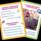 Zwei Karten mit Quizfragen: Kaninchen und Futterpflanzen, Huhn legt Eier; Antworten und Lösungen darunter.