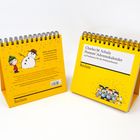 Text: "Charles M. Schulz Peanuts’ Adventskalender" und "Zeitlos, genial, kultig". Gelber Aufsteller mit Comicfiguren.