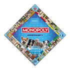 „MONOPOLY“, „HUNDEBABYS“. Spielbrett mit Welpenfotos und klassischen Monopoly-Feldern auf blauem Hintergrund.