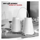"My Life Story" und "Joined Up Talking". Zwei große Trichterformen mit einem Kabel, im Hintergrund Bäume und Gebäude.