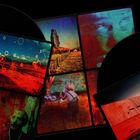 Text: "BOARDS OF CANADA" oben, "INFERNO" unten. Hintergrund mit verschwommenen Figuren in warmen Farben.
