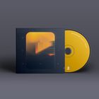 "Dave Stapleton" und "Quiet Fire" auf gelber CD, daneben Hülle mit unscharfem, abstraktem Bild in warmen Farbtönen.