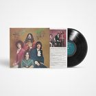 Auf einem Schallplattencover steht "The Book of Taliesyn". Vier Männer in bunten Anzügen posieren stilvoll.