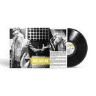 Text: "Ben Caplan". 
Cover eines Vinyl-Albums, ein Mann mit Bart spricht ins Mikrofon.