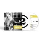 Text "BEN CAPLAN" auf gelbem Hintergrund. Person mit Bart und Mütze am Mikrofon, gestikulierend. CD-Hülle mit Logo.