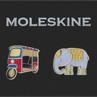 Text "MOLESKINE". Darunter bunte Illustrationen: links ein dreirädriges Fahrzeug, rechts ein Elefant.