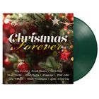"Christmas Forever" in geschwungener Schrift, mit Namen legendärer Musiker darunter. Hintergrund: Weihnachtsbaum mit Dekorationen.