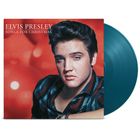 Text: "Elvis Presley Songs for Christmas". Ein Porträt eines Mannes, blaues Vinyl vor rotem Hintergrund.