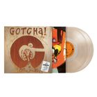 "Gotcha!" steht auf einem Cover. Darunter eine große, stilisierte Grafik eines G. Die Schallplatte daneben ist transparent.