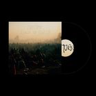Oben steht „TURNOVER DOWN ON EARTH“. Darunter eine Menschenmenge auf einem Feld in der Dämmerung. Schallplatte sichtbar.
