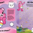 Meet Cheer Bear! Caring is in the air! All Aboard! Here to cheer! Illustration eines rosa Bären mit Regenbogen-Bauchabzeichen.