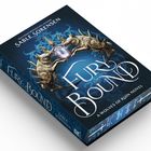 "Fury Bound" von Sable Sorensen, A Wolves of Ruin Novel. Schmuck mit zwei goldenen Wölfen und einem Kristall.