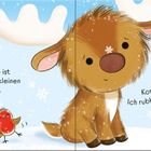 "Brrr, ist das kalt! Eine Schneeflocke ist auf der Nase des kleinen Rentiers gelandet." Ein Rentier mit Schneeflocken.