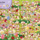 „Picnic Pals“ steht oben. Darunter sind bunte Zeichnungen von lächelnden Lebensmitteln auf grünem Hintergrund.