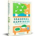 Texte: "Seasonal Happiness", "The Korean Secret to Joy", "Kim Shinji". Illustration: Bäume und ein Tisch mit Essen.