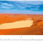 Text: "Deadvlei", "1", Zahlen von 1 bis 31 unten. 

Rotes Wüstenpanorama mit heller Salzpfanne.